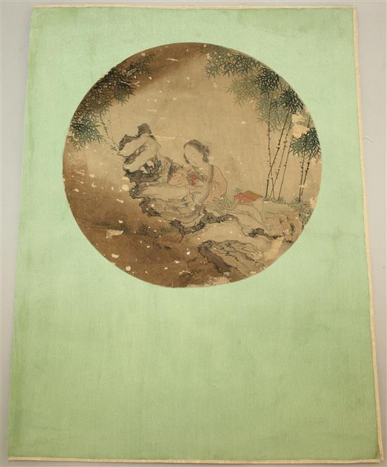 A 19th century Chinese School painting of a lady seated on a rock in a bamboo grove, diam. 25cm, mounted on a folder